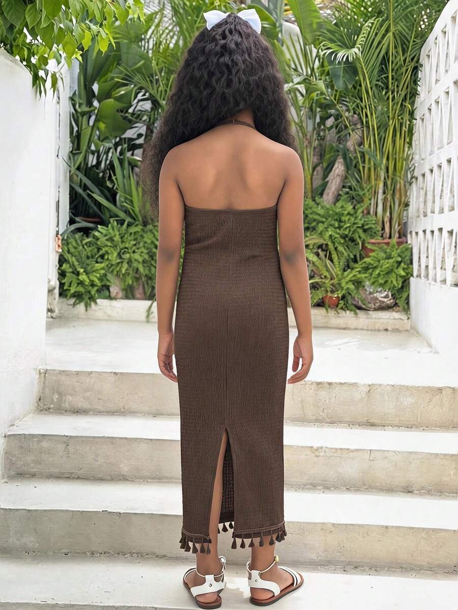 White sleeveless halter maxi dress for tween girls with slim fit, plain textured fabric, natural waist, pencil hem, and side split for summer daily wear and vacation outfits.