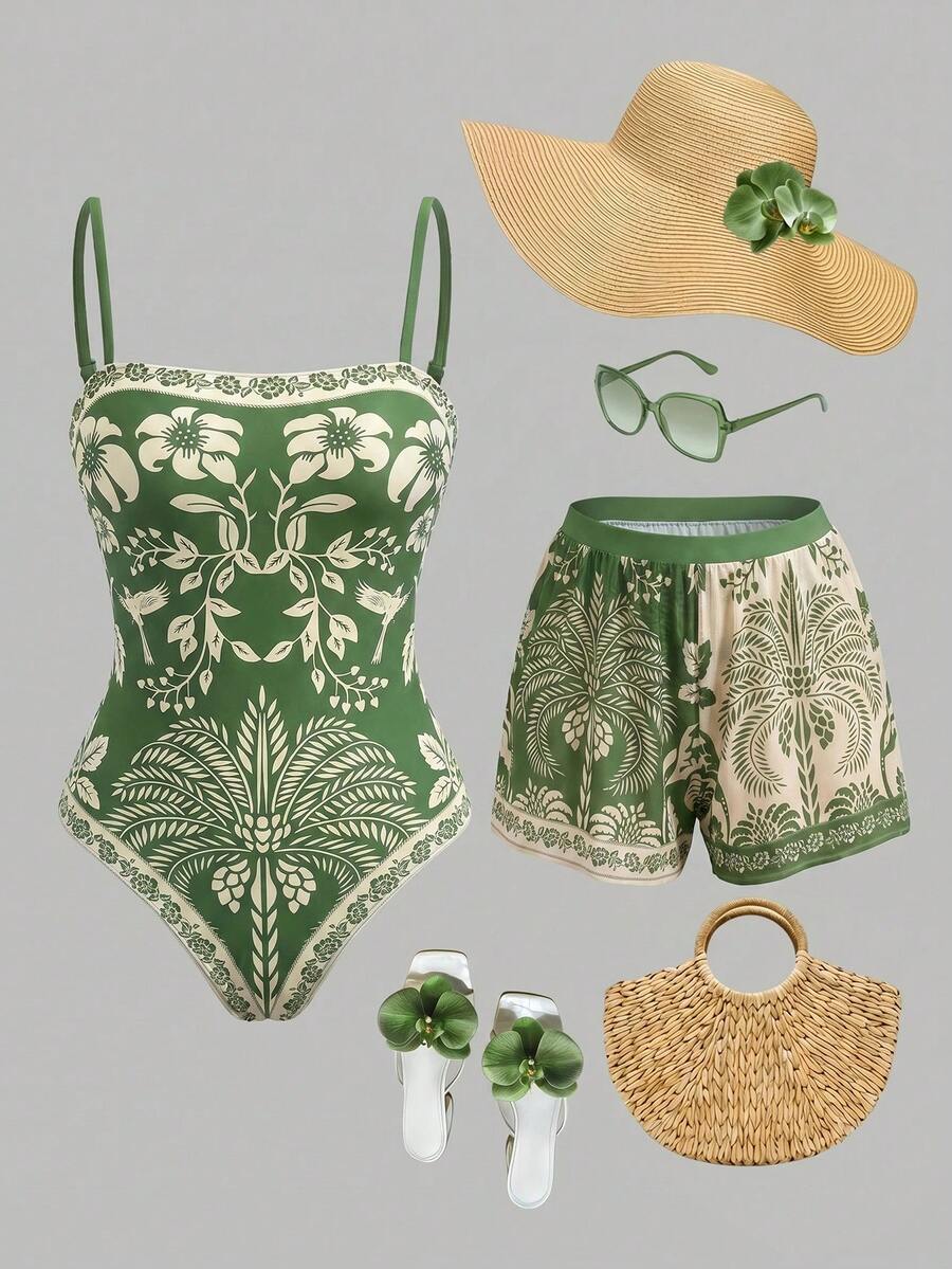 Swim Oasis women's tropical palm tree print army green one-piece swimsuit featuring spaghetti straps, removable padding, and matching shorts for beach vacations.