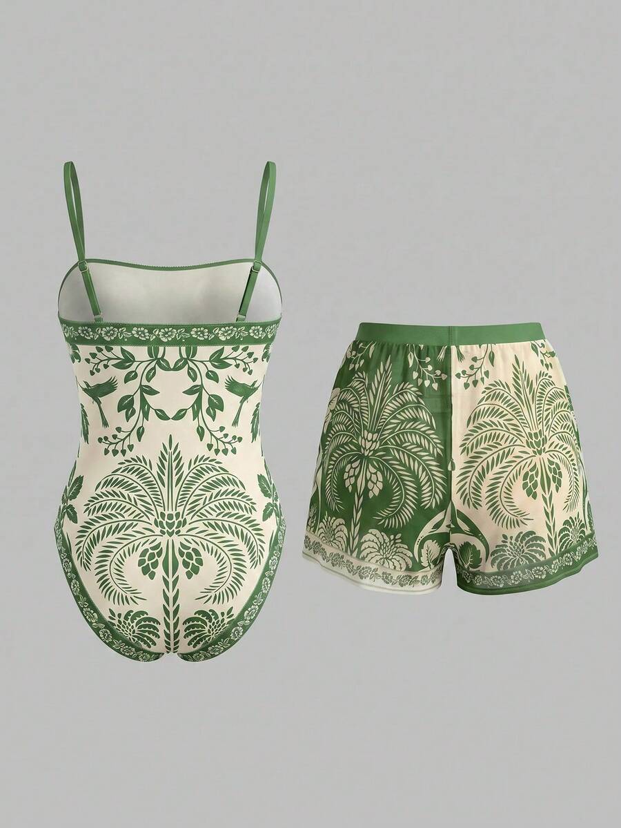 Swim Oasis women's tropical palm tree print army green one-piece swimsuit featuring spaghetti straps, removable padding, and matching shorts for beach vacations.