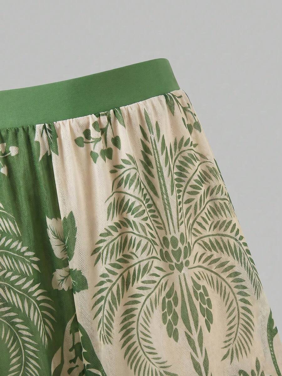 Swim Oasis women's tropical palm tree print army green one-piece swimsuit featuring spaghetti straps, removable padding, and matching shorts for beach vacations.