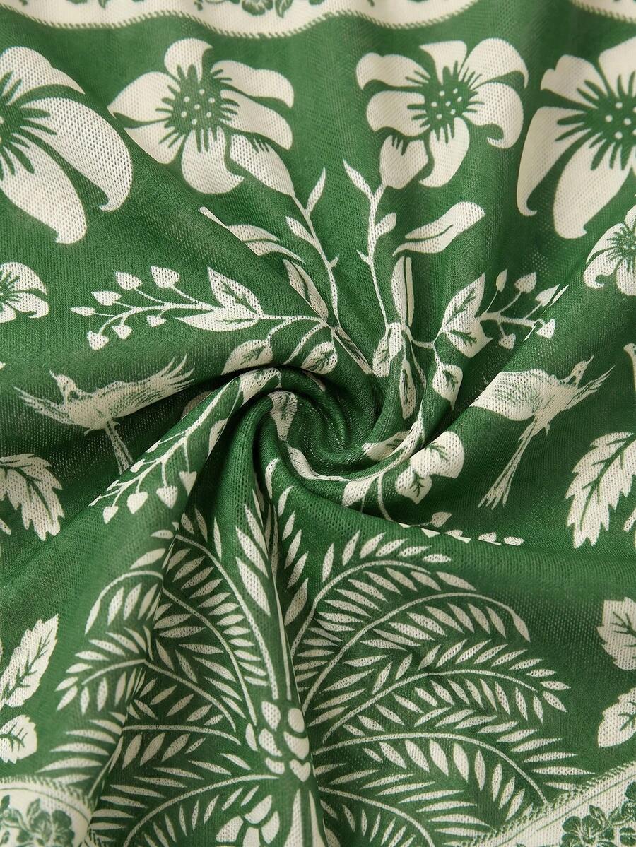Swim Oasis women's tropical palm tree print army green one-piece swimsuit featuring spaghetti straps, removable padding, and matching shorts for beach vacations.