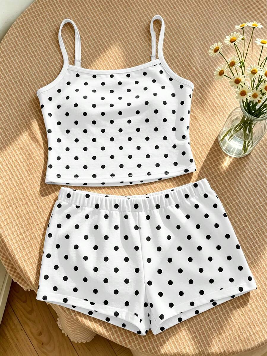Tween girls summer 2-piece Hawaiian style outfit featuring a graphic print spaghetti strap camisole top with contrast piping and matching casual shorts.