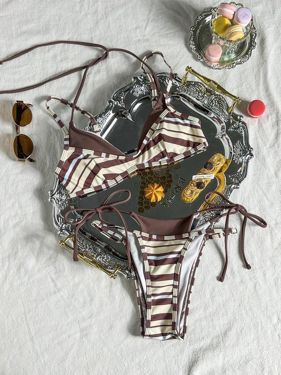 Women's retro polka dot high waist bikini swimsuit set with spaghetti straps and knot tie-back top.