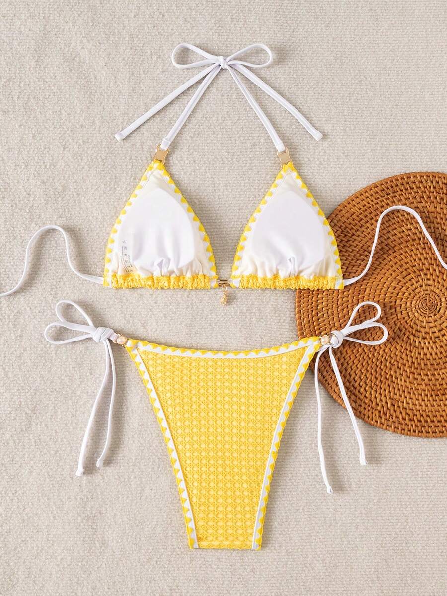 Women's triangle bikini set with contrast lace wireless bra top and ultra high waist tie side bottoms.