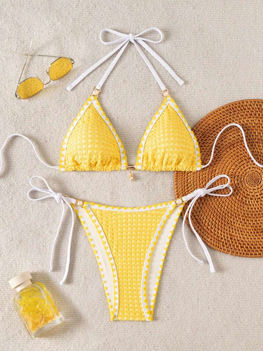 Women's triangle bikini set with contrast lace wireless bra top and ultra high waist tie side bottoms.