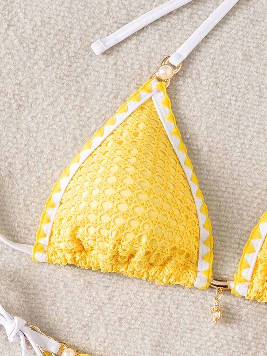 Women's triangle bikini set with contrast lace wireless bra top and ultra high waist tie side bottoms.