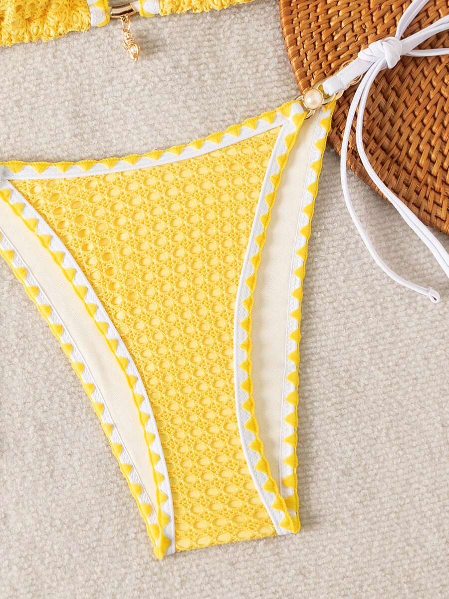 Women's triangle bikini set with contrast lace wireless bra top and ultra high waist tie side bottoms.