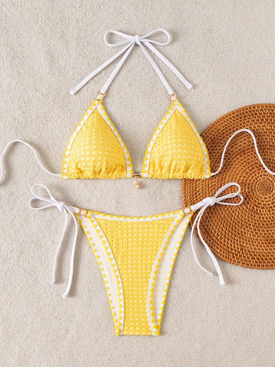 Women's triangle bikini set with contrast lace wireless bra top and ultra high waist tie side bottoms.