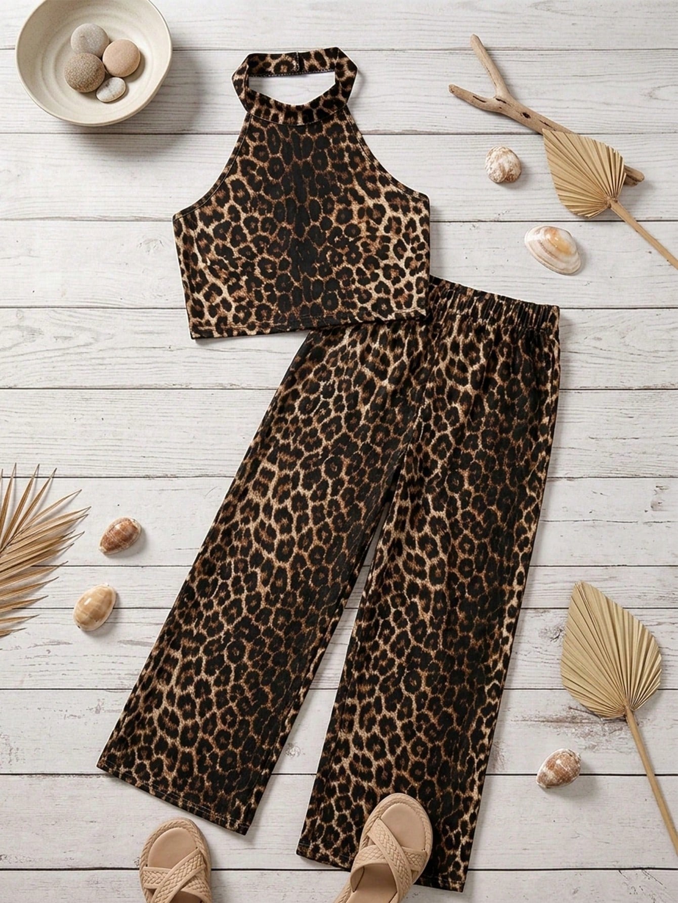 Tween girls casual apricot striped two-piece set featuring a sleeveless halter short top with curved hem and matching long pants.