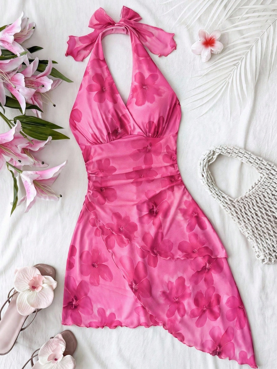 Hot pink tween girls floral print halter dress with sleeveless cami design, high waist, asymmetrical hem, and short slim fit for summer vacation wear