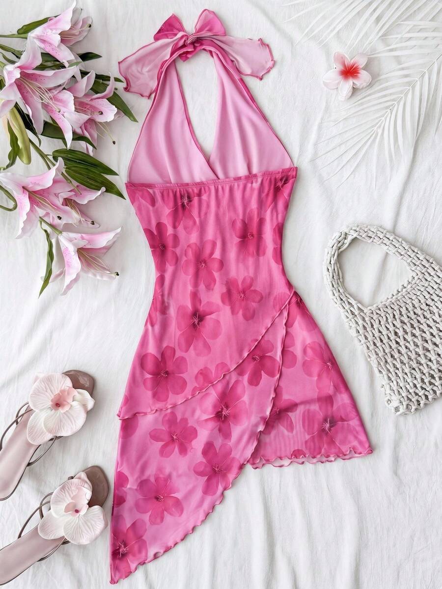 Hot pink tween girls floral print halter dress with sleeveless cami design, high waist, asymmetrical hem, and short slim fit for summer vacation wear