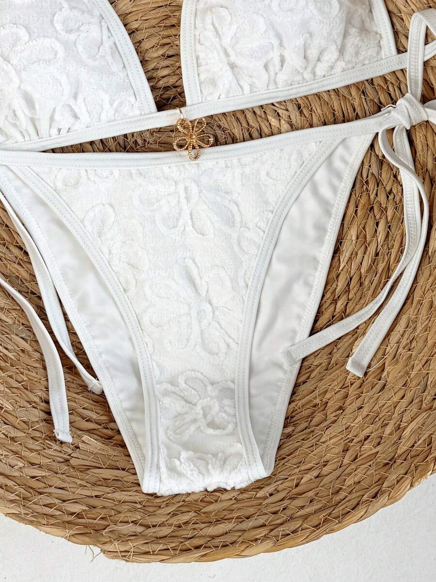 Women's apricot solid halter tie bikini top with triangle cups and matching tie-side swimsuit bottoms.