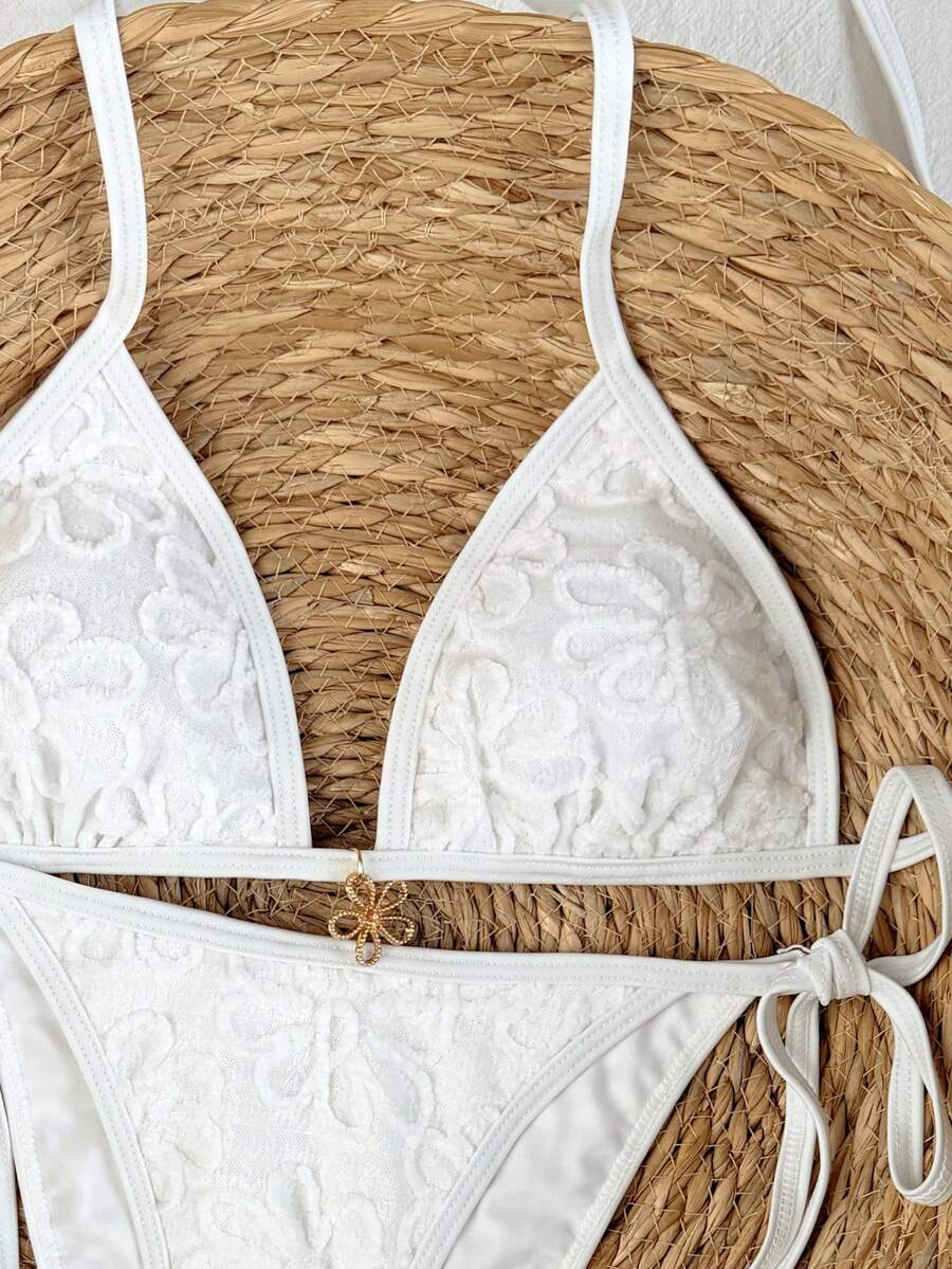 Women's apricot solid halter tie bikini top with triangle cups and matching tie-side swimsuit bottoms.