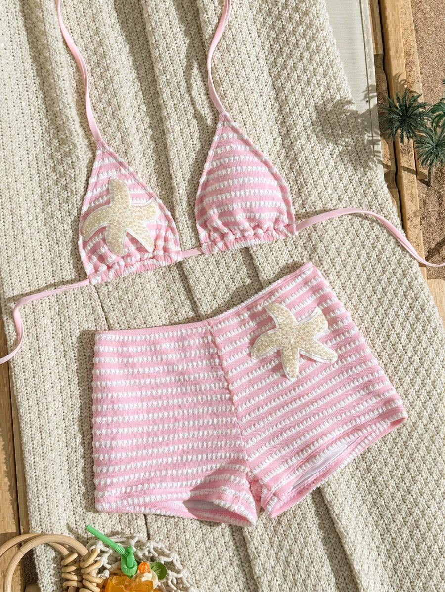 Women's apricot two-piece swimsuit set with a halter tie-back top and matching high stretch shorts.