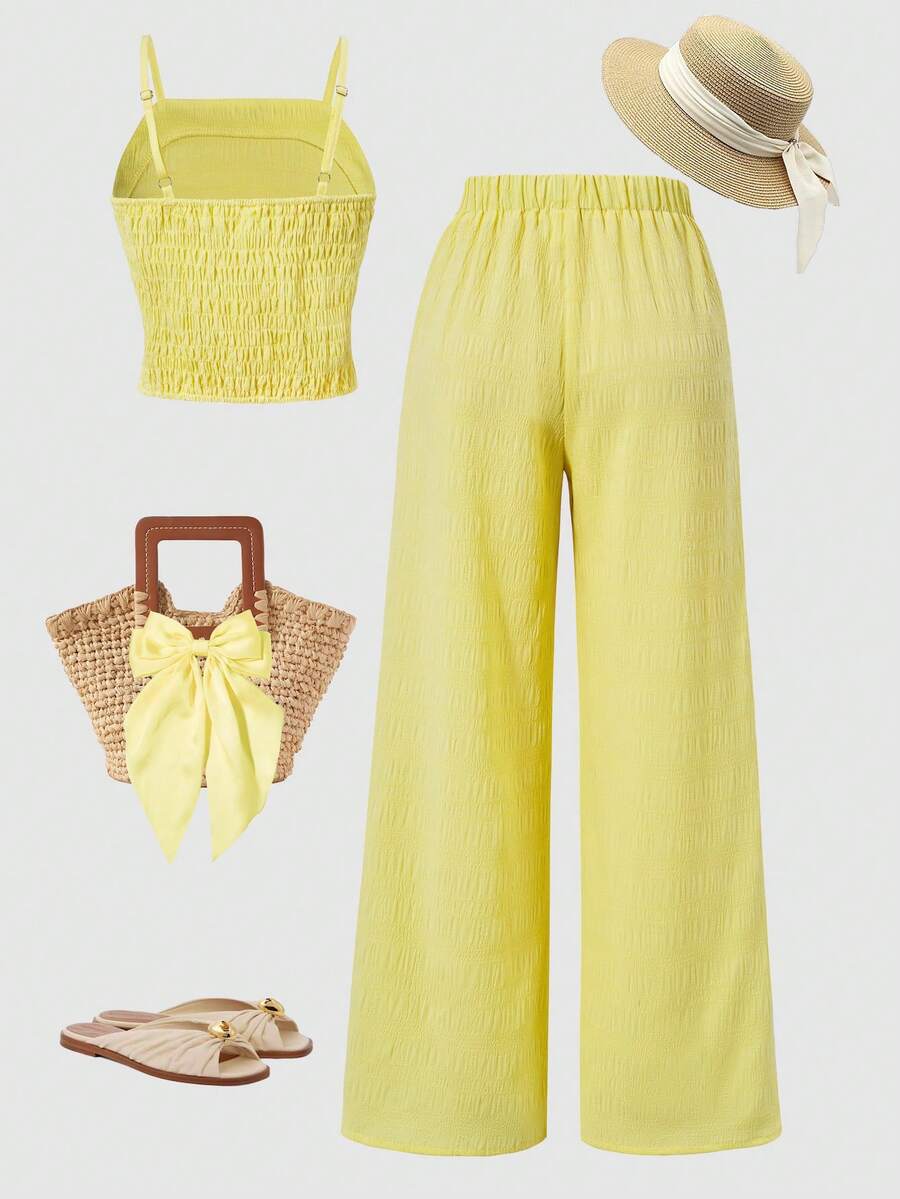 Tween girls casual 2-piece set featuring an apricot woven camisole crop top with back shirring and matching high-waisted loose long pants.