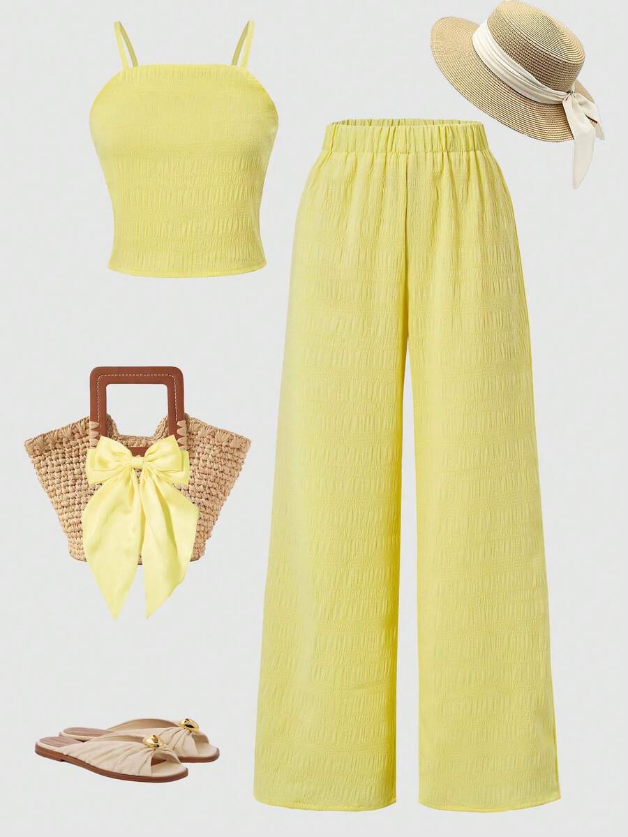 Tween girls casual 2-piece set featuring an apricot woven camisole crop top with back shirring and matching high-waisted loose long pants.