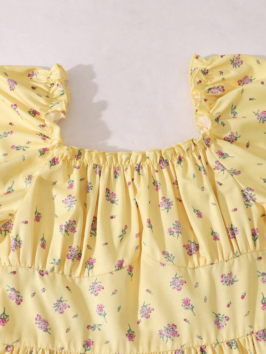 Apricot tween girls dress featuring square neckline, short puff sleeves, ruched bust, high waist, and flared A-line hem.