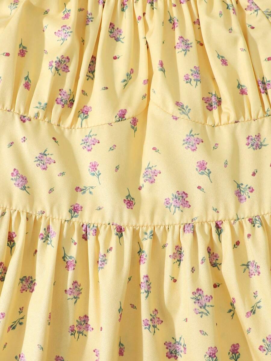 Apricot tween girls dress featuring square neckline, short puff sleeves, ruched bust, high waist, and flared A-line hem.