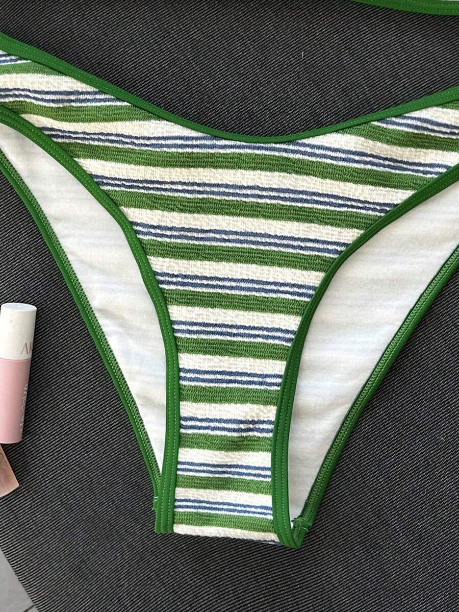 Apricot ribbed high waist two piece bikini swimsuit set for women featuring backless spaghetti strap top and high waisted bottoms.