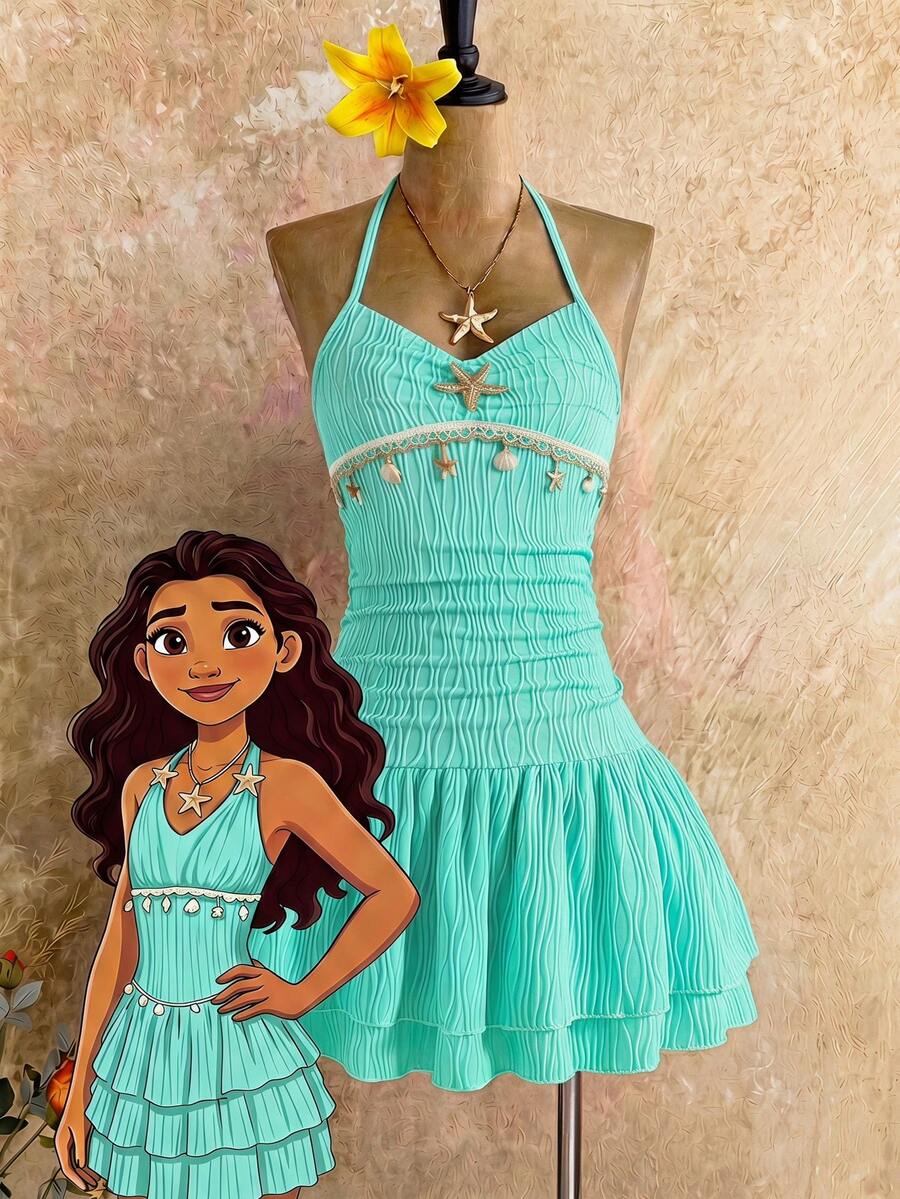 Tween girls apricot sleeveless halter mini dress with textured starfish and shell decor, shirred tiered layer, high waist, and flounce hem.