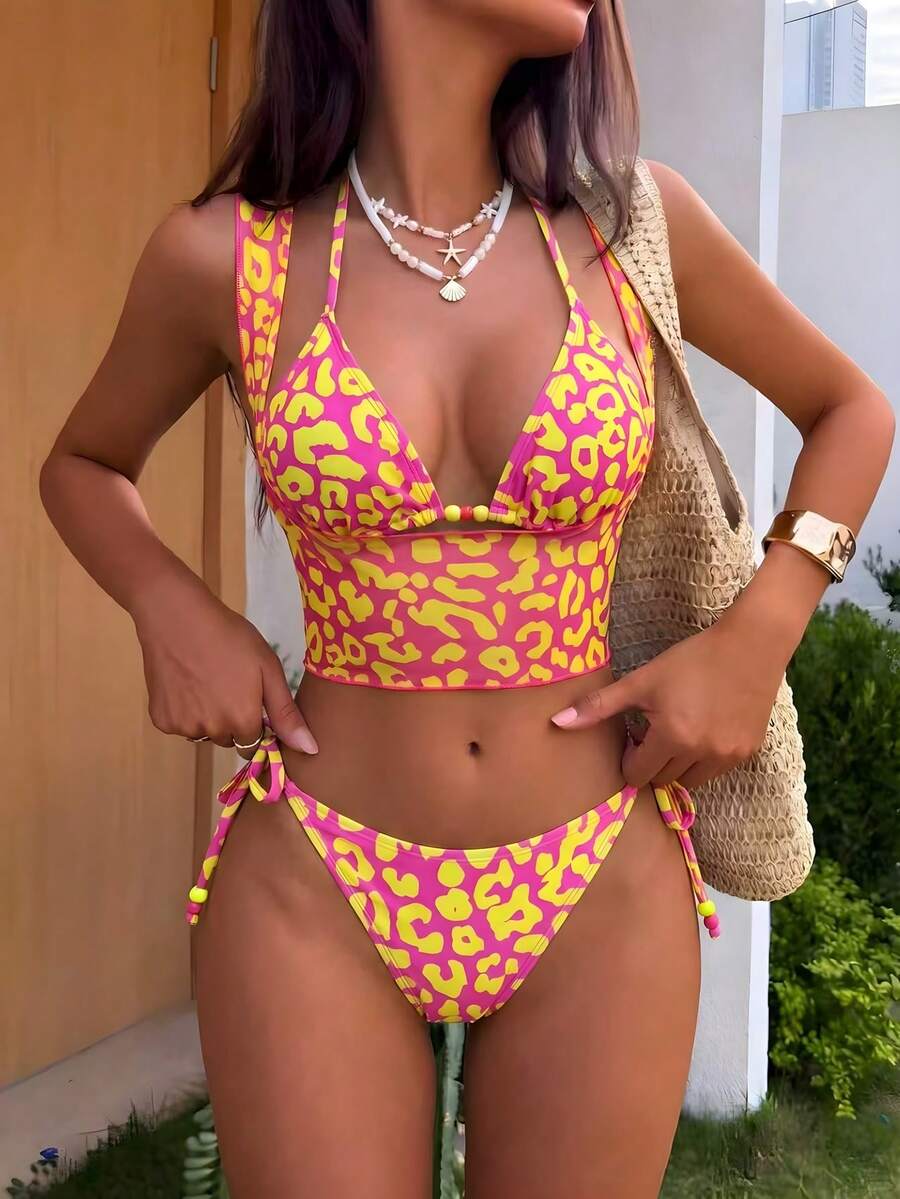 Brown striped 3-piece bikini set for women featuring a halter tie neck, wireless triangle cups with removable padding, cut-out details, and low waist tie side bottoms.