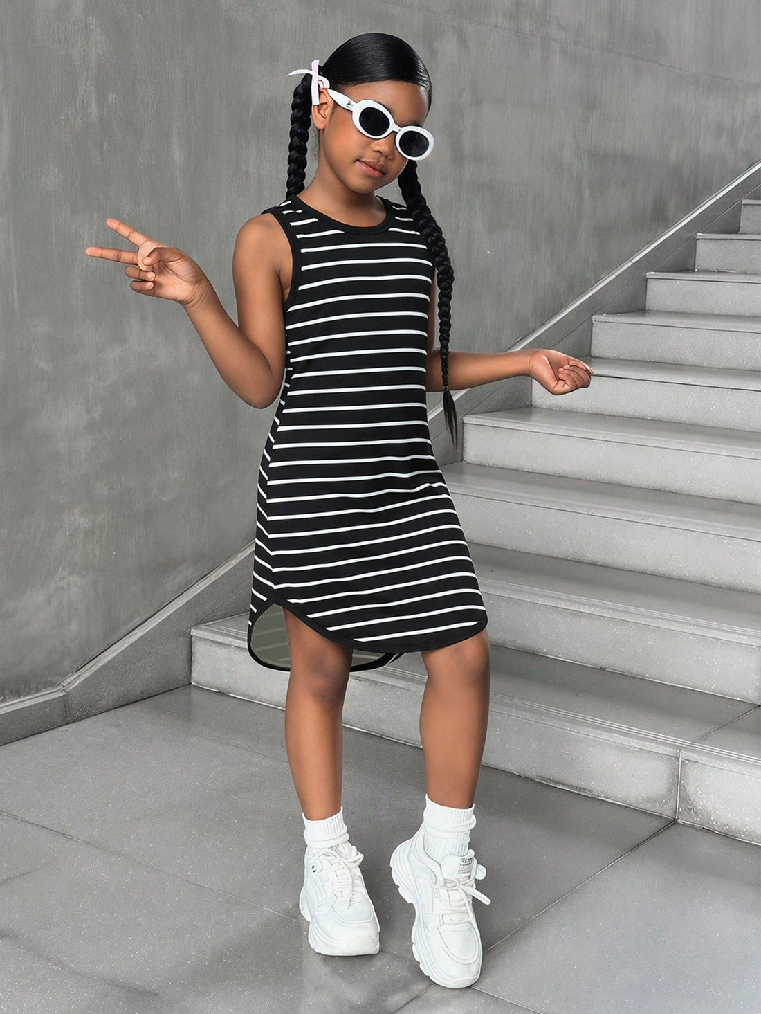 Tween girls sleeveless tie-dye tank dress with round neck, loose fit, short length, and asymmetrical hem in a casual streetwear style