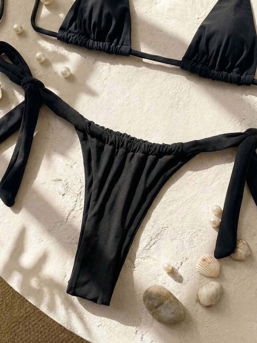 Army green high waist micro bikini swimsuit set for women featuring wireless spaghetti strap top with chain knot details and tie side thong bottoms.
