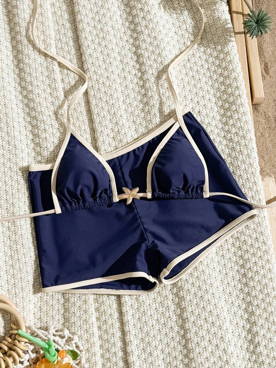 Women's apricot two-piece swimsuit set with a halter tie-back top and matching high stretch shorts.