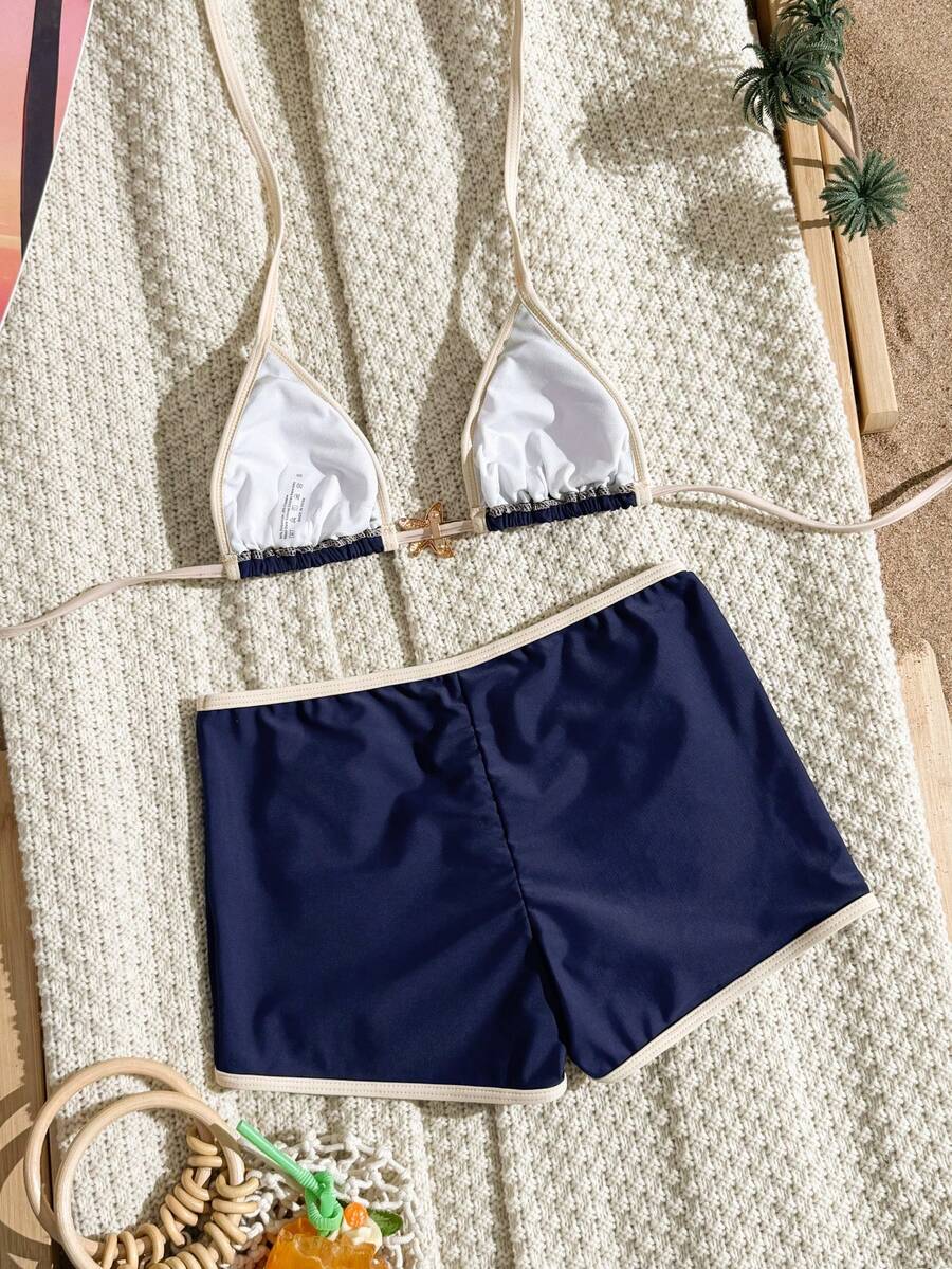 Women's apricot two-piece swimsuit set with a halter tie-back top and matching high stretch shorts.