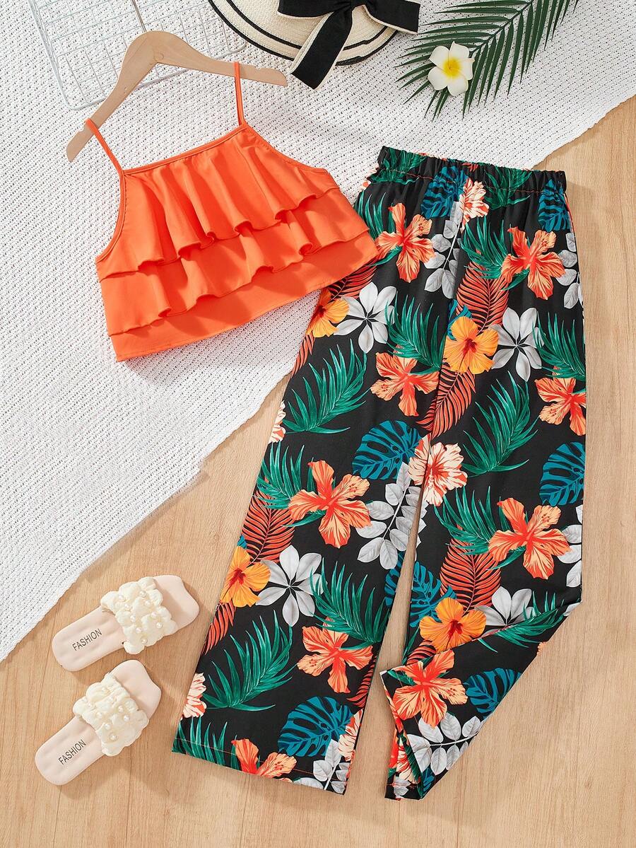 Tween girls blue 2-piece vacation outfit set featuring a tiered ruffle spaghetti strap camisole and loose high-waist pants.