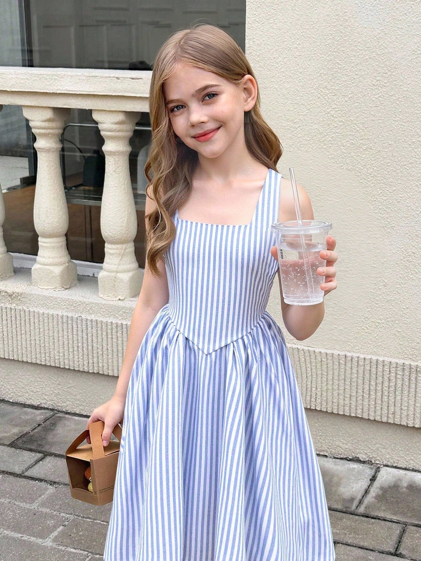 Tween girls pink floral sleeveless A-line midi dress featuring round neck, high waist with belt, contrast lace, and zipper back.