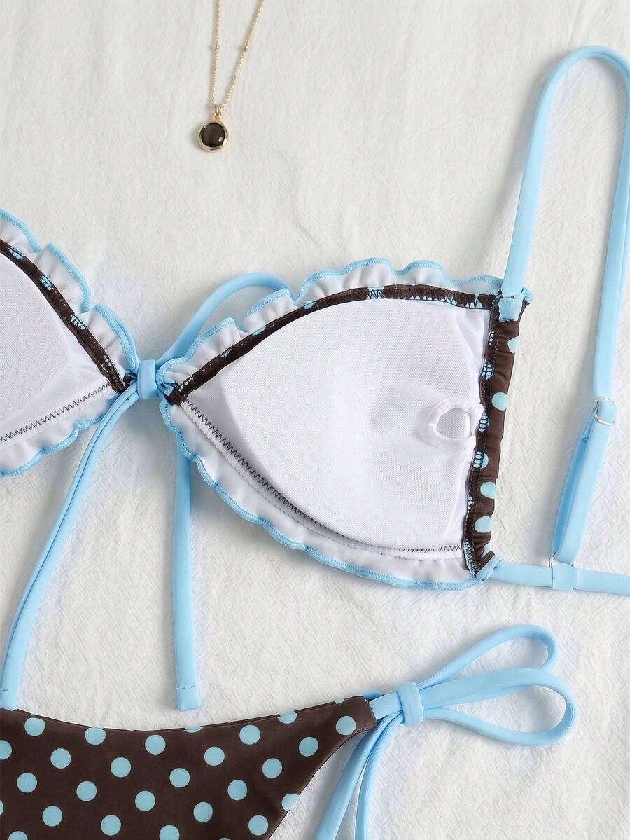 Women's beige two-piece bikini set featuring a wireless top with removable padding, spaghetti straps, tie back detail, and low waist hipster swimsuit bottoms.