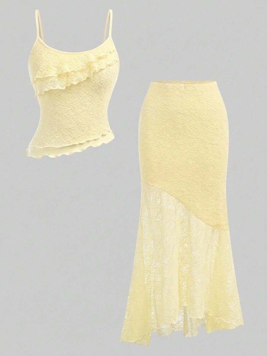 Tween girls blue 2-piece set featuring a short spaghetti strap lace tank top with asymmetrical lettuce trim and a long matching skirt.