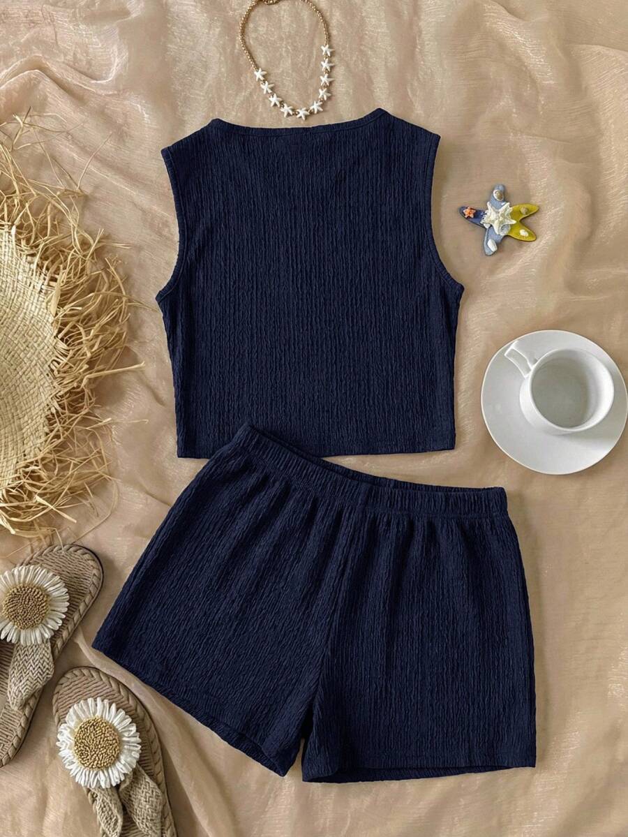 Tween girls black rib-knit round neck slim fit top and textured shorts casual summer set.