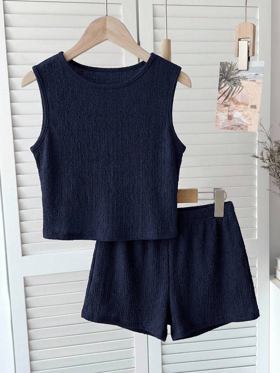 Tween girls black rib-knit round neck slim fit top and textured shorts casual summer set.