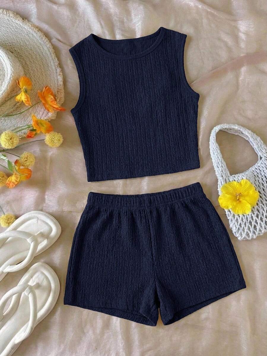 Tween girls black rib-knit round neck slim fit top and textured shorts casual summer set.