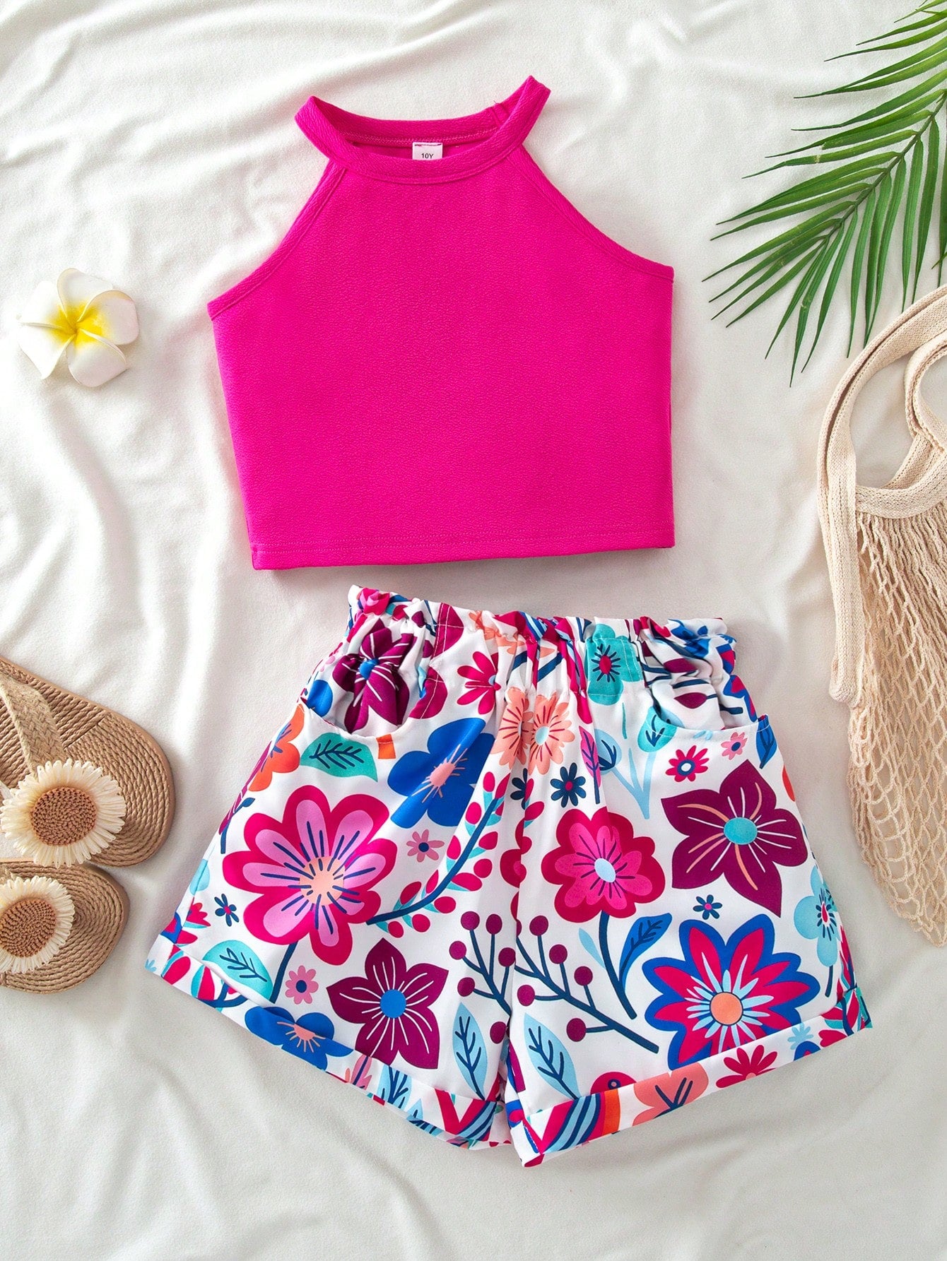 Tween girl 2-piece casual outfit set featuring a solid beige knit halter sleeveless top with belted detail and matching shorts.