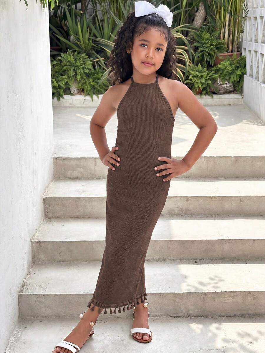 White sleeveless halter maxi dress for tween girls with slim fit, plain textured fabric, natural waist, pencil hem, and side split for summer daily wear and vacation outfits.