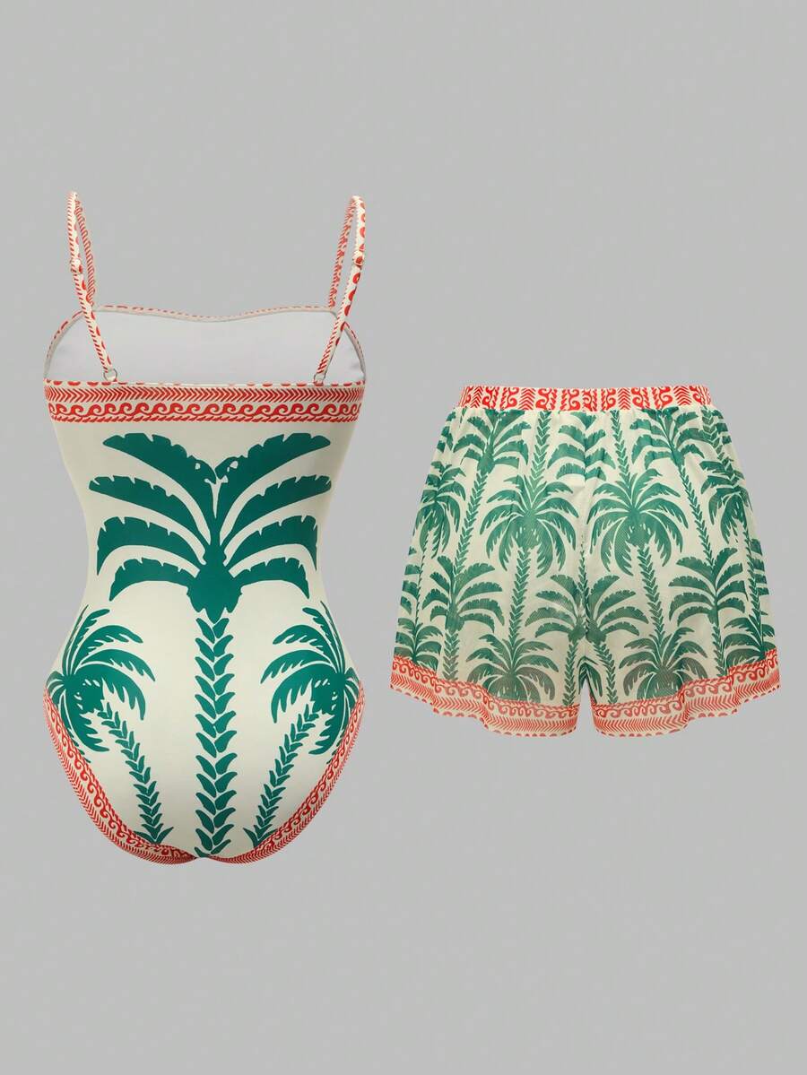 Swim Oasis women's tropical palm tree print army green one-piece swimsuit featuring spaghetti straps, removable padding, and matching shorts for beach vacations.