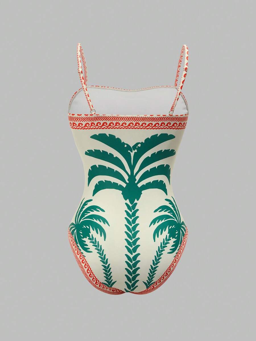 Swim Oasis women's tropical palm tree print army green one-piece swimsuit featuring spaghetti straps, removable padding, and matching shorts for beach vacations.