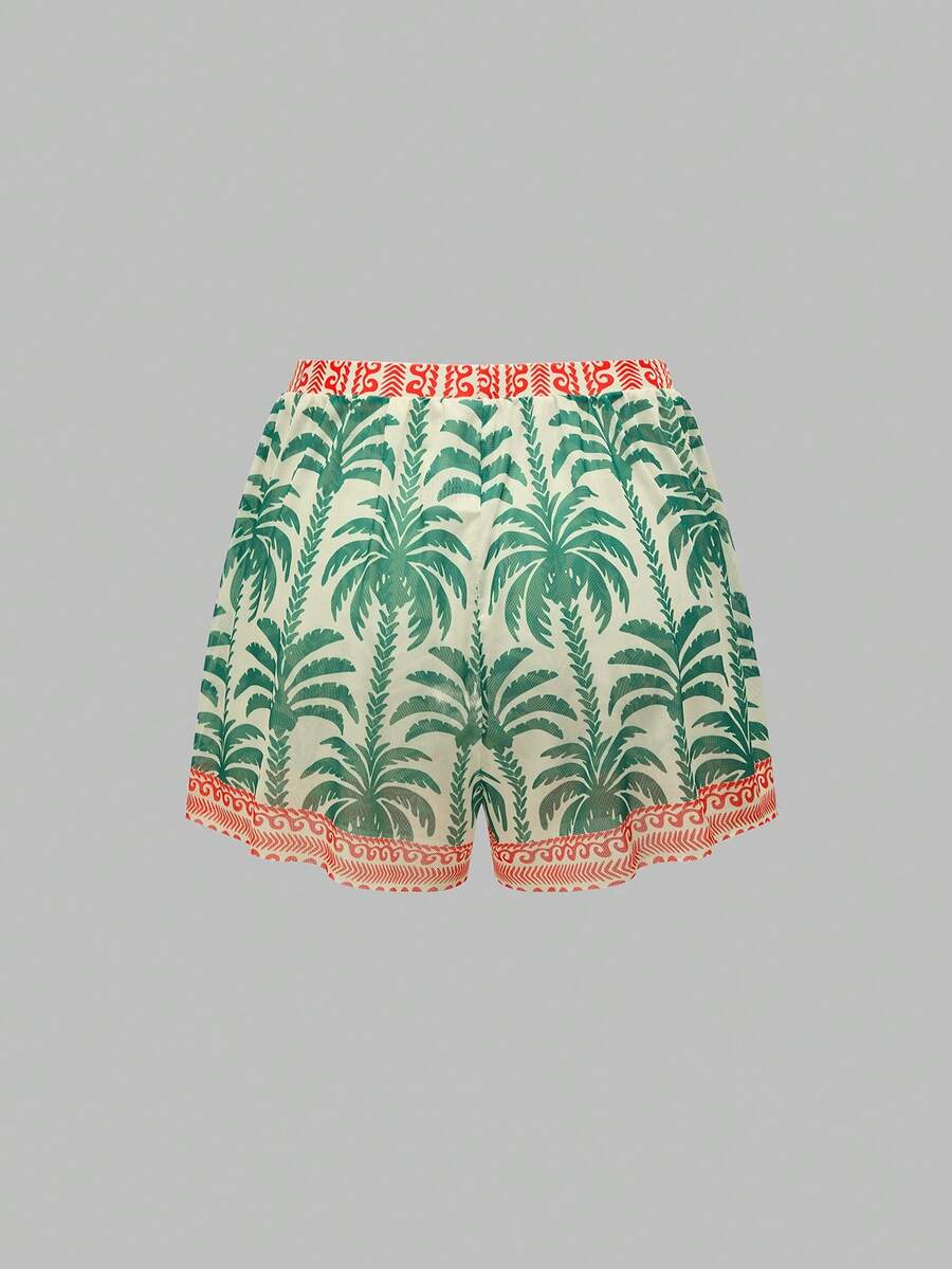 Swim Oasis women's tropical palm tree print army green one-piece swimsuit featuring spaghetti straps, removable padding, and matching shorts for beach vacations.