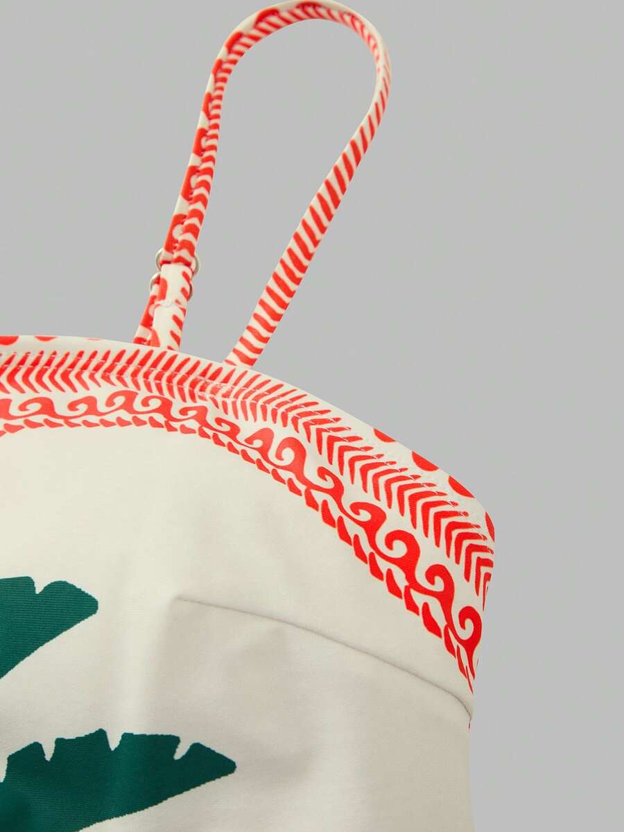 Swim Oasis women's tropical palm tree print army green one-piece swimsuit featuring spaghetti straps, removable padding, and matching shorts for beach vacations.