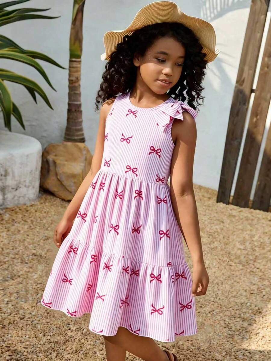 Tween girls blue striped sleeveless smock dress featuring a round neckline, high waist, and flounce ruffle hem.