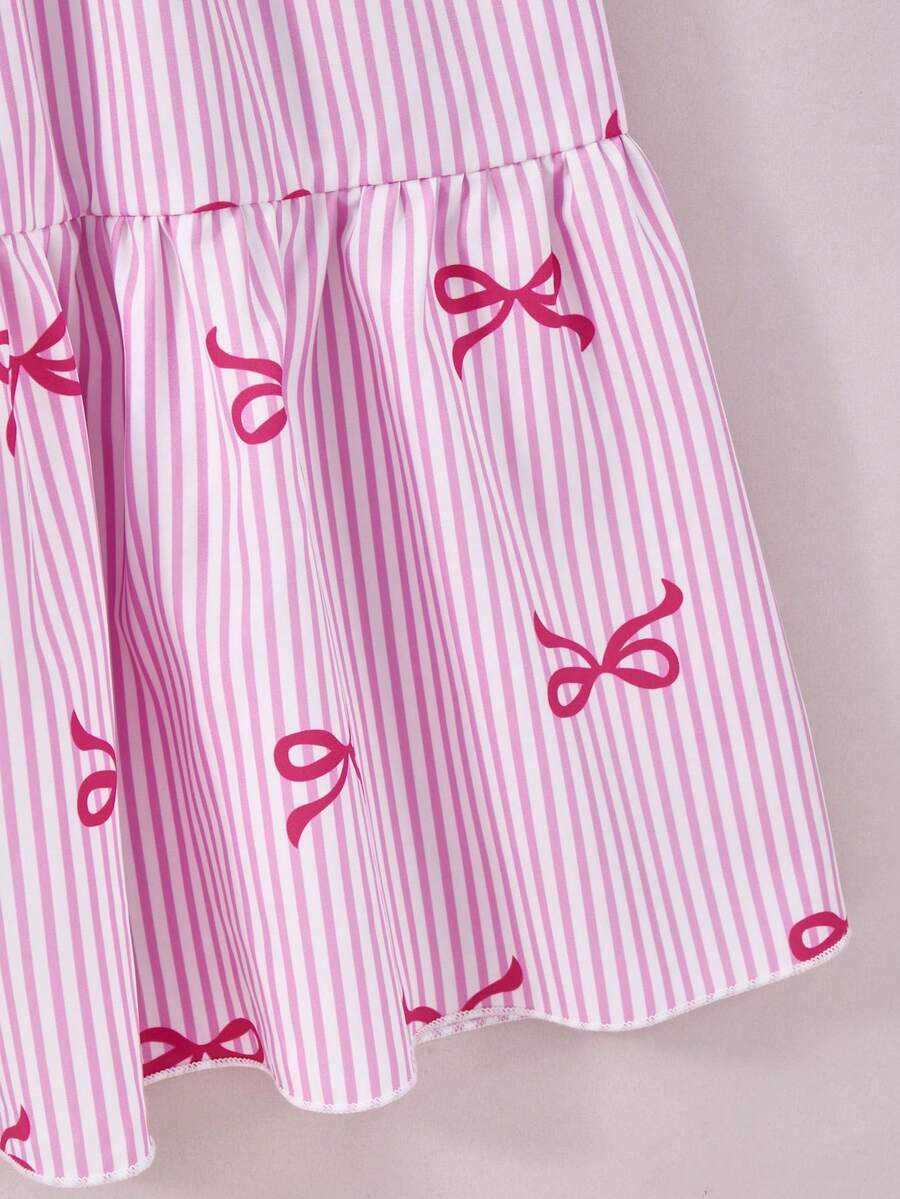 Tween girls blue striped sleeveless smock dress featuring a round neckline, high waist, and flounce ruffle hem.