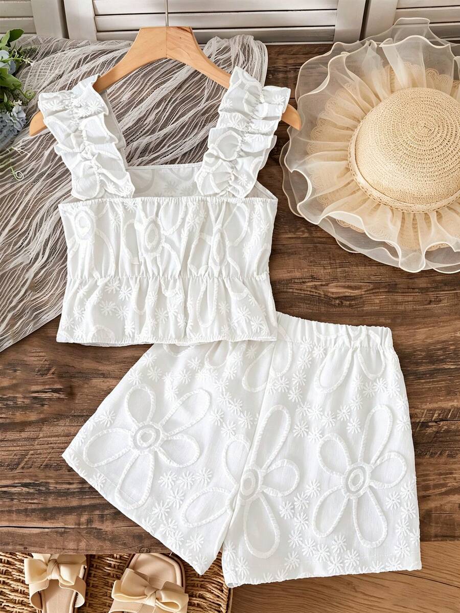 Apricot two-piece summer outfit for tween girls featuring a sleeveless pleated square-neck camisole top with button details and matching gathered shorts.