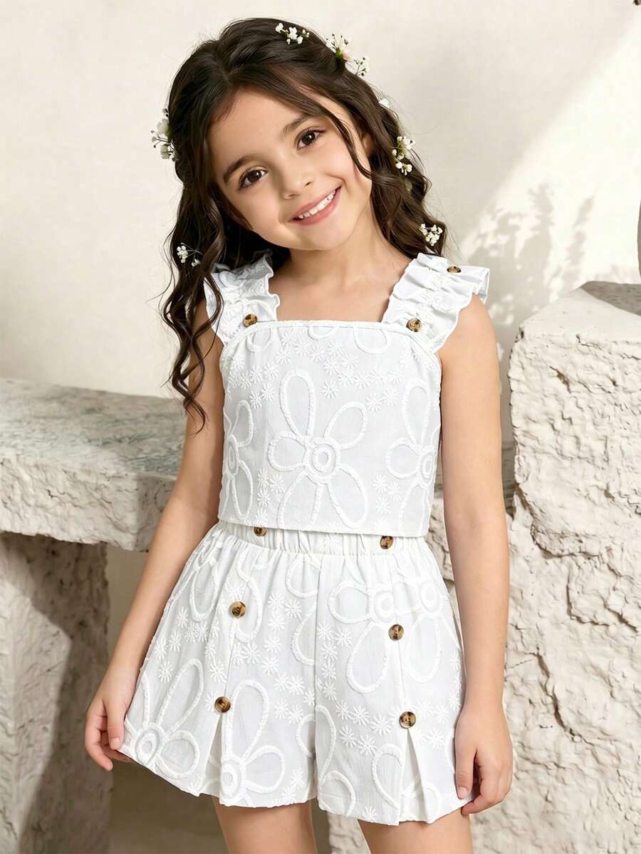 Apricot two-piece summer outfit for tween girls featuring a sleeveless pleated square-neck camisole top with button details and matching gathered shorts.