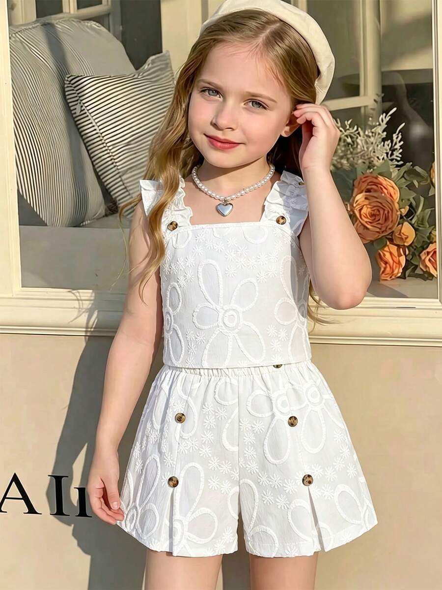 Apricot two-piece summer outfit for tween girls featuring a sleeveless pleated square-neck camisole top with button details and matching gathered shorts.