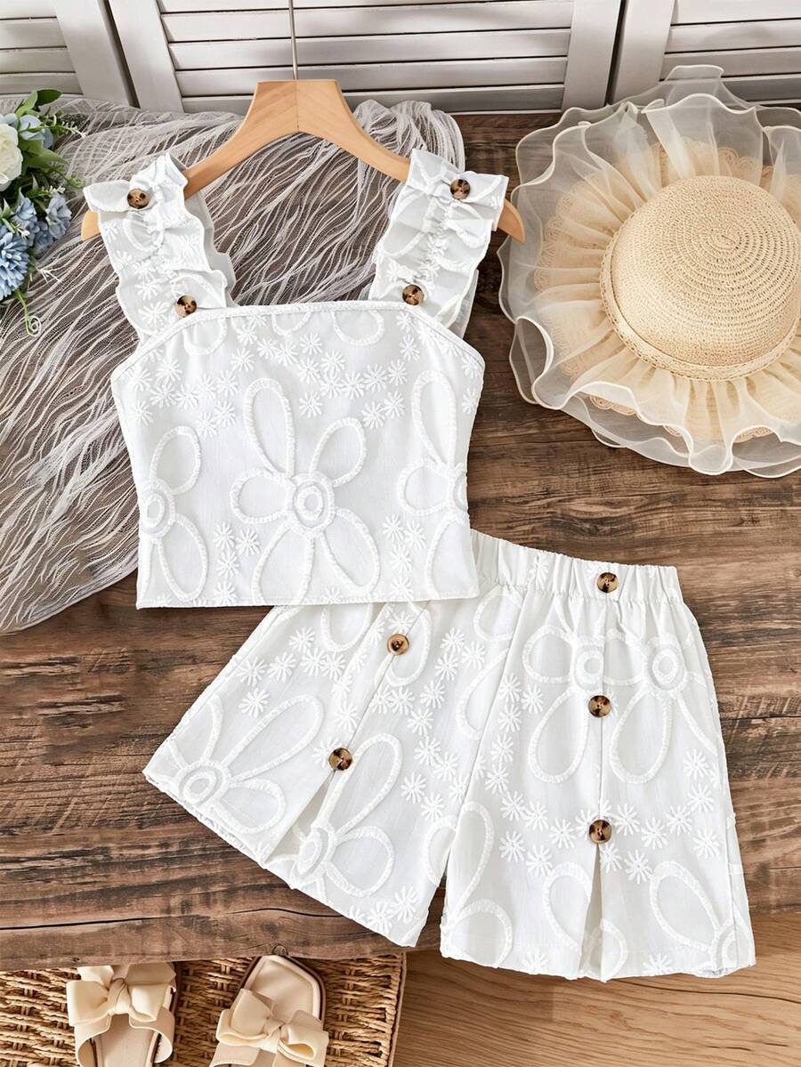 Apricot two-piece summer outfit for tween girls featuring a sleeveless pleated square-neck camisole top with button details and matching gathered shorts.