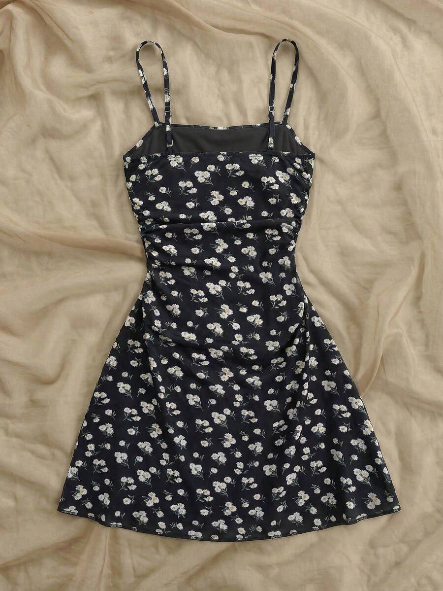 Yellow sleeveless tween girls cami dress with spaghetti straps, ruched bust, shirred details, high waist, and flared short A-line hem for vacation wear.