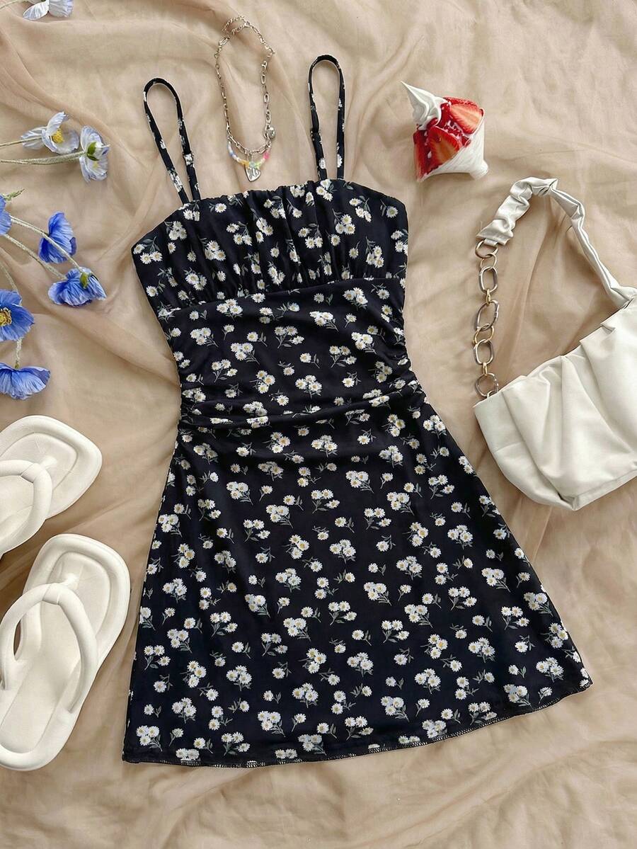 Yellow sleeveless tween girls cami dress with spaghetti straps, ruched bust, shirred details, high waist, and flared short A-line hem for vacation wear.